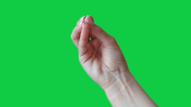 A woman's hand shows the Italian gesture meaning "What the hell are you saying?"  "what do you want from me" with one hand. An emotional gesture in an argument between Italians. Famous italian gesture