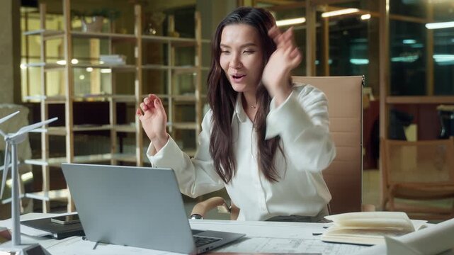 Asian business worker woman finish computer work happy businesswoman close laptop satisfied Chinese Korean Japanese female end job done girl designer architect accomplish project going walk out office