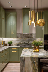 Luxurious, modern kitchen with green cabinets, exotic marble countertops and backsplash, gold accents, and elegant lighting. Sophisticated and unique design.