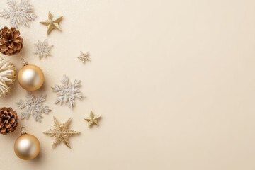 Festive holiday decorations with golden ornaments, pine cones, and snowflakes on a soft background, copy space