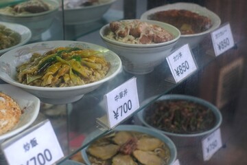 Food samples (called shokuhin sampuru in Japanese) — also known as food replicas or fake food — are hyper-realistic plastic models of dishes displayed in restaurant windows. Made from plastic or resin