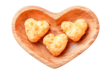 Heart shaped bowl with heart shaped snacks isolated on transparent background