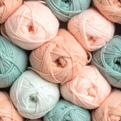 Seamless macro texture of soft pastel yarn, close-up of twisted fibers in peach and mint tones