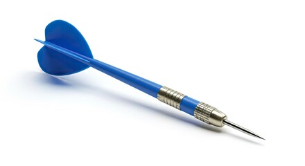 A blue dart with a metal tip lies on a white surface casting a soft shadow