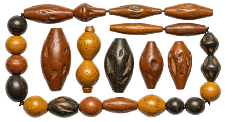 A close up of a necklace with various shapes and colors of beads on a black background studio shot on transparent background