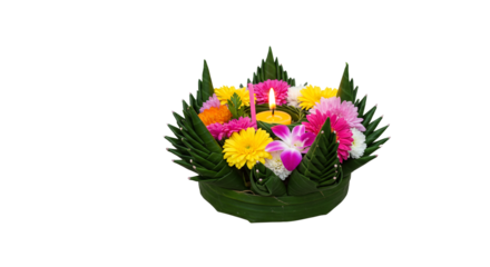 A krathong decorated with flowers and a candle for the loy krathong festival in thailand tradition on transparent background