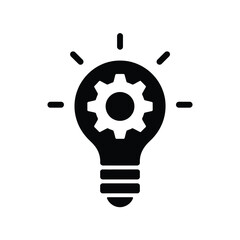 Black silhouette of a lightbulb with a gear inside symbolizing innovation and mechanical ideas