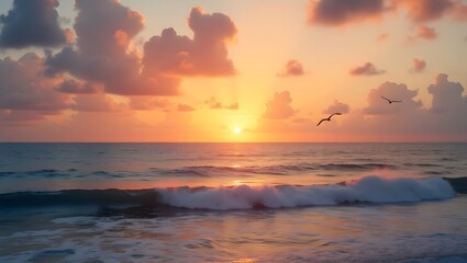 Obraz premium Serene ocean sunset landscape; gentle waves, pink clouds, silhouetted birds in flight.