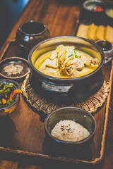 Perilla Seed Samgyetang organic chicken soup in a stone pot
