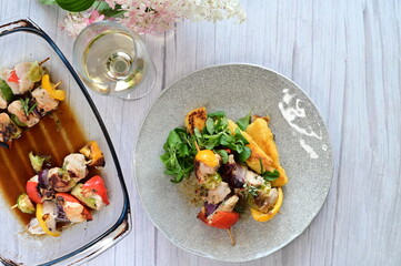 Colorful grilled chicken skewer with vibrant vegetables as a delicious food background. 