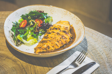 Cajun Chicken Steak with Black Pepper Sauce
Free-range chicken breast seared & roasted in house blend Cajun marination; black pepper sauce & side salad