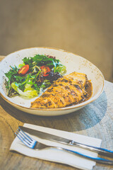 Cajun Chicken Steak with Black Pepper Sauce
Free-range chicken breast seared & roasted in house blend Cajun marination; black pepper sauce & side salad