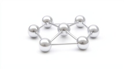 Metallic spheres connected by rods forming a geometric structure on a plain white background for technology and science concepts