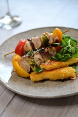 Colorful Lunch Dish with Chicken Skewer on Light Background