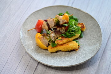 Colorful Lunch Dish with Chicken Skewer on Light Background