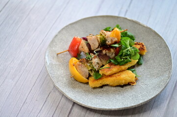 Colorful Lunch Dish with Chicken Skewer on Light Background