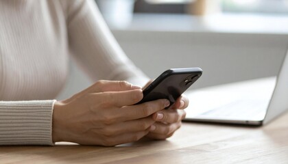 Focused individual scrolling through applications on a smartphone, illustrating digital connectivity and modern communication.