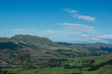 Scenic Rolling Hills Under a Clear Blue Sky