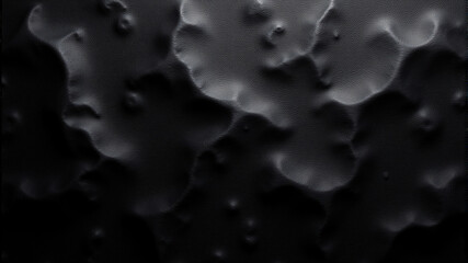 Close-up of Black Pebbles with Surface Texture