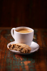 Cup of coffee on wooden background. Soft focus. Copy space	