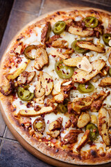Gyros Pizza with jalapeno pepper and mozzarella cheese. Soft focus. Close up.	