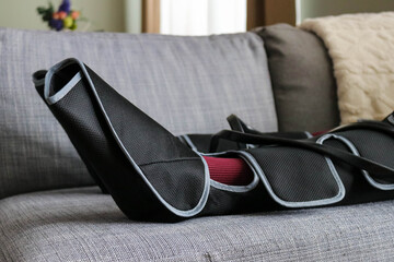 Air compression leg massager on the couch