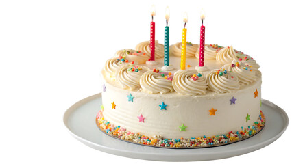 A deliciously decorated birthday cake with four lit candles on a white plate
