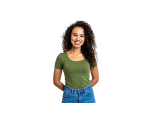 Smiling young woman with long curly hair wearing a green tshirt and blue jeans posing with hands behind her back.
