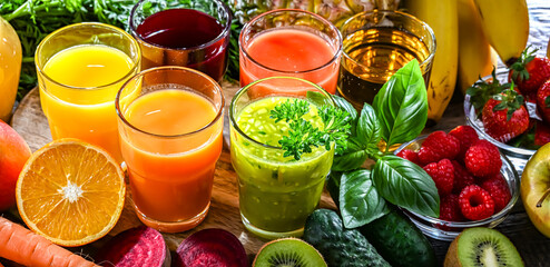 Glasses with fresh organic vegetable and fruit juices