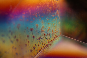 Multicoloured chemical liquid surface, phenomenal abstract photography, interference pattern 
