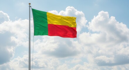 Benin National Flag Waving on Tall Flagpole in Sky with Clouds – Benin Independence Day Celebration, Patriotism, Freedom, Benin Culture & Heritage