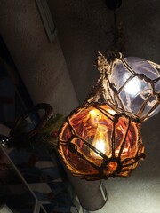 Two stained glass ball-shaped lanterns