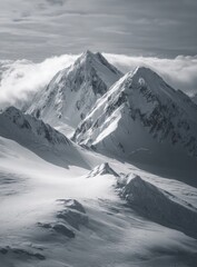 Obraz premium Majestic snow-capped peaks pierce a hazy sky