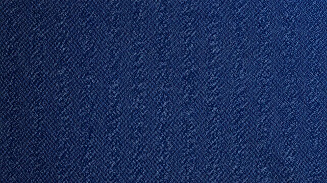 Dark Blue Fabric Surface with a Fine Weave Pattern Presents a Visually Appealing and Versatile Textile Backdrop