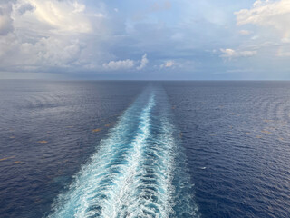 The wake left in the ocean behind a large shp