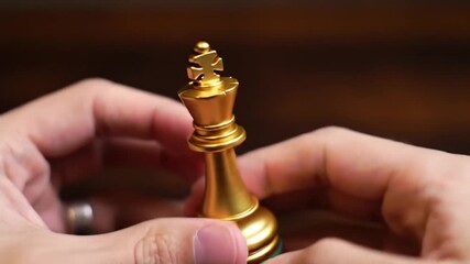 chess pieces in hand
