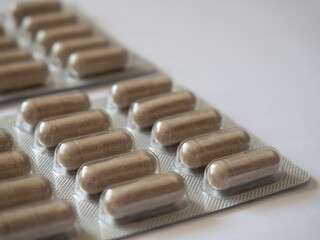 Packs of pills on white background