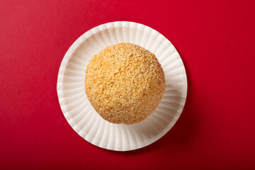 top view traditional Chinese fried sesame ball on a dish
