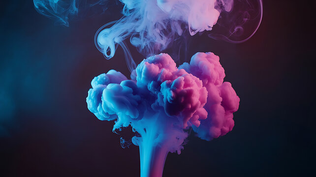 Abstract ink clouds in vibrant blue and pink hues.
