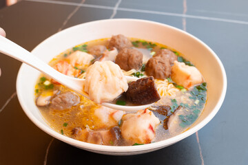 angle view bowl of ChaoZhou beef offal and various seafood ingredients at horizontal composition