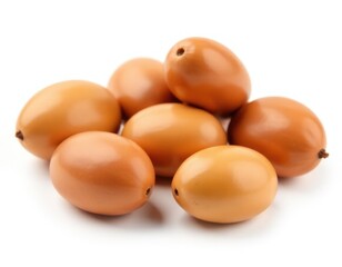 A collection of brown fruits stacked on top of each other, ideal for food and still life photography
