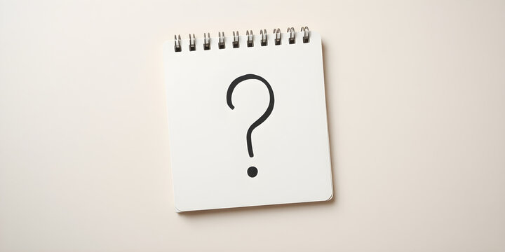 The notebook with a question mark symbolizes curiosity and creativity in design