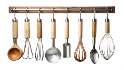 Kitchen Utensils Hanging on a Rack Against a Black Background