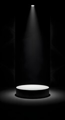 Minimalist black stage with a white podium illuminated by a single spotlight, product presentation