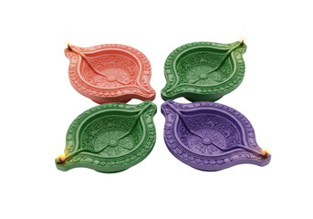 Photo of four colorful clay diyas are arranged in a square, representing the festival of diwali isolated on transparent background
