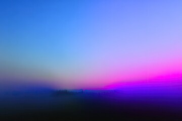 Naklejka premium Colorful Sunrise Landscape With Fog