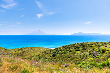 View of Samos, Fournoi islands at Faros in Ikaria island, Greece crystal clear water at Aegean Ikarian sea of Mediterranean in longevity blue zone