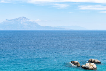Samos, Fournoi islands at horizon from Ikaria island, Greece Aegean Ikarian sea of Mediterranean in longevity blue zone and azure blue water