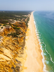 Gale Beach and Hoodoos Cliffs on Sunny Day. Atlantic Ocean, Portugal. Aerial View
