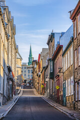 Fototapeta premium Historic streets and buildings in Old Quebec City under bright sunligh